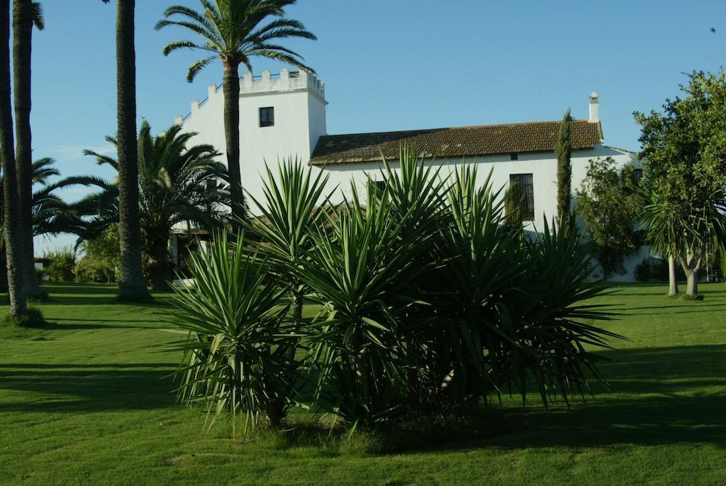 Отель Hacienda La Indiana Лос-Паласьос-и-Вильяфранка Экстерьер фото